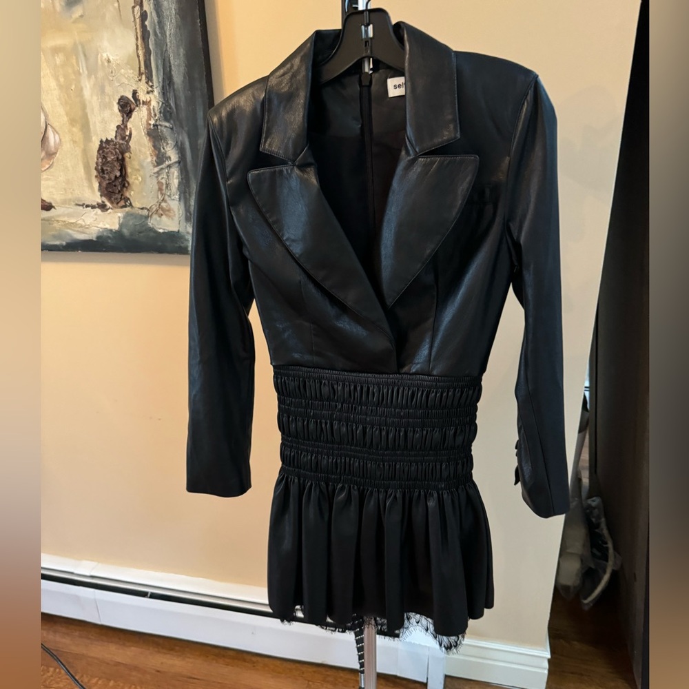 Leather mini dress with lace trimming